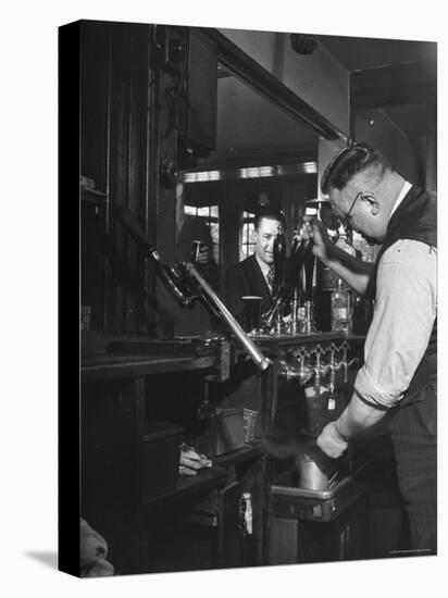 Robert Neve Buying Round of Beer at Bar-Hans Wild-Premier Image Canvas