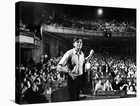 Rock Promoter Bill Graham Onstage with Audience Visible, at Fillmore East-John Olson-Premier Image Canvas