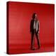 Rock Star Jim Morrison of the Doors Standing Behind Microphone Alone Against a Red Backdrop-Yale Joel-Premier Image Canvas