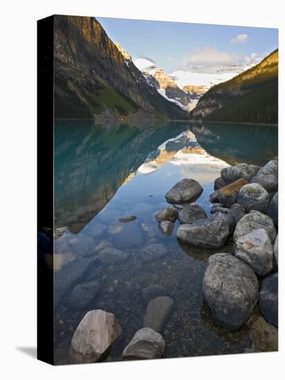 Rocky Mountains and Boulders Reflected in Lake Louise, Banff National Park, Alberta, Canada-Larry Ditto-Premier Image Canvas