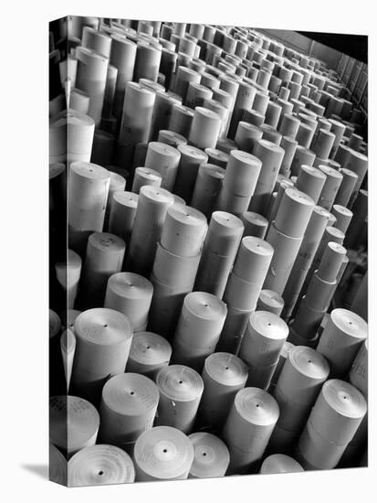 Rolls of Kraft Paper to Be Made into Paper Sacks Sit Stacked in the Union Bag and Paper Corp. Plant-Margaret Bourke-White-Premier Image Canvas