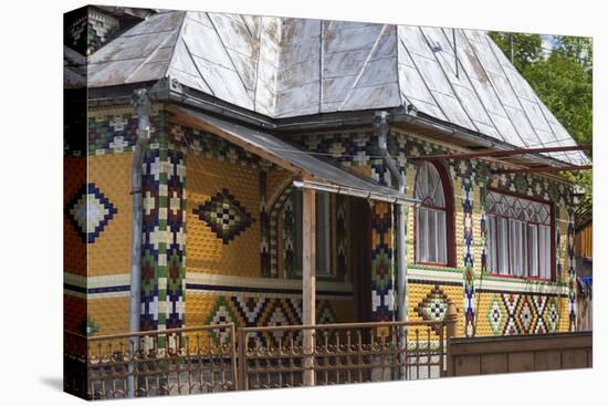 Romania, Maramures Region, Rona de Jos, Ornate Tiled House-Walter Bibikow-Premier Image Canvas