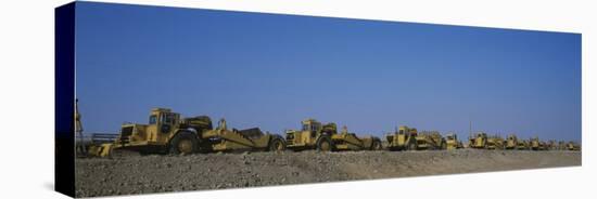 Row of Bulldozers at a Construction Site-null-Premier Image Canvas