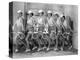 Row of Female Tennis Players in Matching Outfits-null-Stretched Canvas