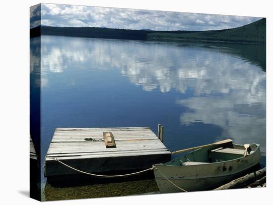 Rowboat Moored at Edge of Lake Showing Reflections of Clouds in Its Still Waters, in New England-Dmitri Kessel-Premier Image Canvas