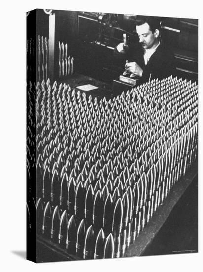 Rows of 15 cm Shells on Table Where Worker Uses Hammer and Stamping Tool at Skoda Munitions Factory-Margaret Bourke-White-Premier Image Canvas