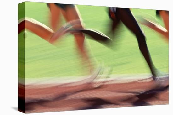 Runners Legs in Motion (Blurred Motion)-Peter Skinner-Premier Image Canvas