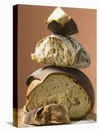 Rustic Bread, Two Loaves with Pieces Cut Off in a Pile-null-Premier Image Canvas