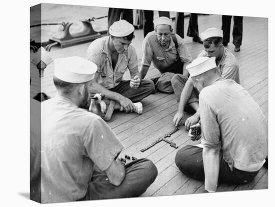 Sailors Aboard a Us Navy Cruiser at Sea Playing a Game of Dominoes on Deck During WWII-Ralph Morse-Premier Image Canvas