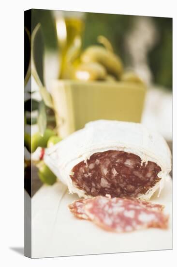 Salami and Green Olives on Table Out of Doors-Foodcollection-Premier Image Canvas