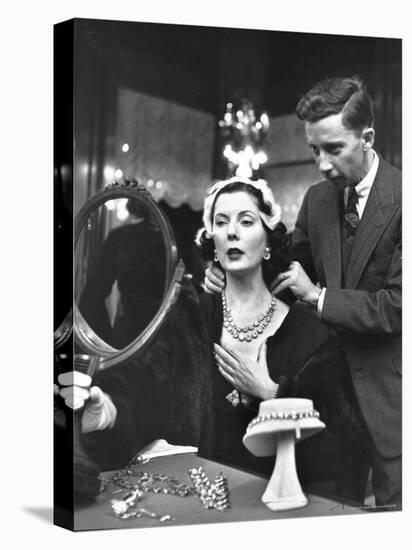 Salesman at Cartier's Showing a Diamond Necklace to Mrs. Julien Chaqueneau of New York Society-Alfred Eisenstaedt-Premier Image Canvas