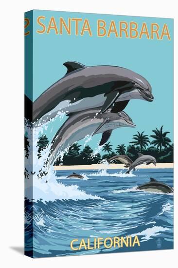 Santa Barbara, California - Dolphins Jumping-Lantern Press-Stretched Canvas