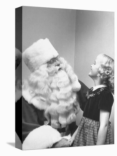 Santa Claus and 5 Year Old Demonstrating Right Way to Hold Child-Martha Holmes-Premier Image Canvas