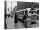 Scene from Seattle During Free Ride Day, with People Boarding a Bus-null-Premier Image Canvas