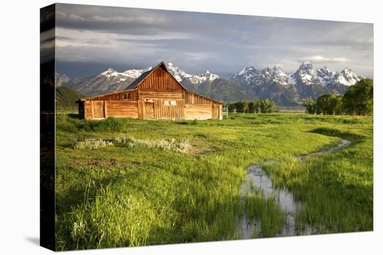 Scenic Landscape Image of the Moulton Barn with Storm Clouds, Grand Teton National Park, Wyoming-Adam Barker-Premier Image Canvas