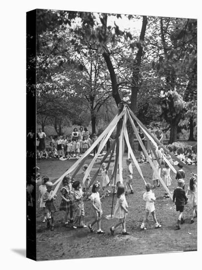 School Children Playing Around the May Pole-Martha Holmes-Premier Image Canvas