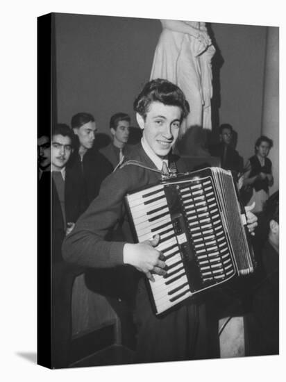 Science Student Playing the Accordian-Ed Clark-Premier Image Canvas