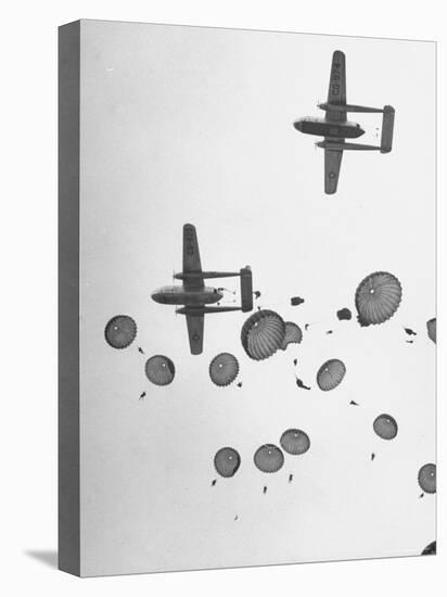 Scores of Paratroopers Dropping from C-82 "Flying Boxcar" and Landing on Level Ground-Frank Scherschel-Premier Image Canvas