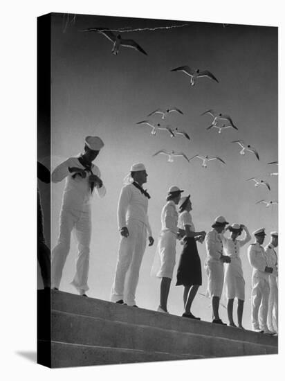 Seagulls Flying Above Group of Sailors and Waves-Alfred Eisenstaedt-Premier Image Canvas