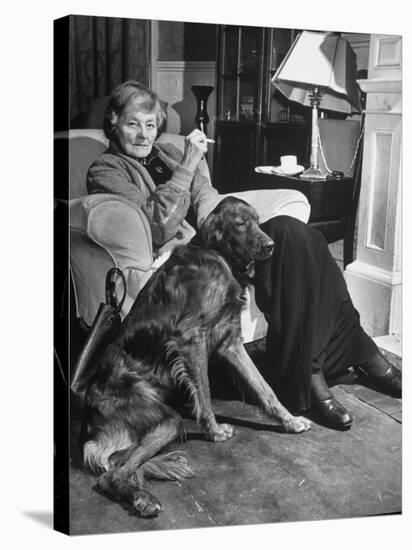 Sean Macbride's Mother, Maud Gonne Macbride, Sitting at Home with Her Dog-Tony Linck-Premier Image Canvas