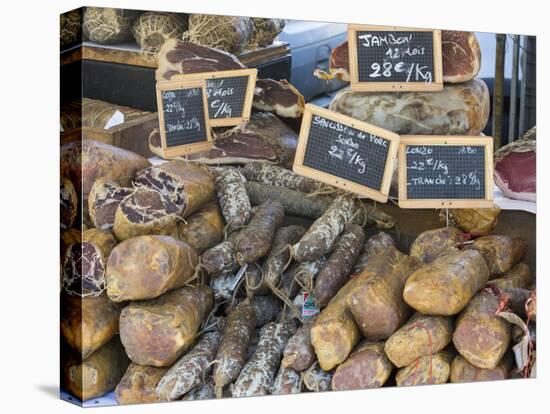 Selection of Corsican sausages and hams for sale at open-air market in Place Foch, Ajaccio-David Tomlinson-Premier Image Canvas