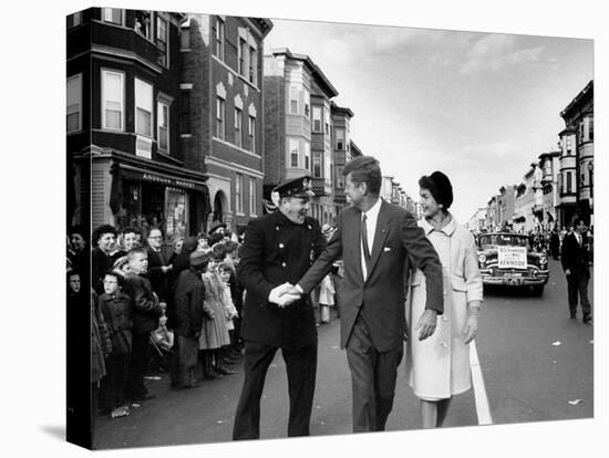 Sen. Jack Kennedy with Jackie, Walking Down Middle of the Street During Senate Re-Election Campaign-Carl Mydans-Premier Image Canvas