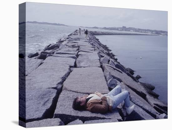 Senator Edward M. Kennedy Basking in Sun on Breakwater in Hyannis Port-John Loengard-Premier Image Canvas