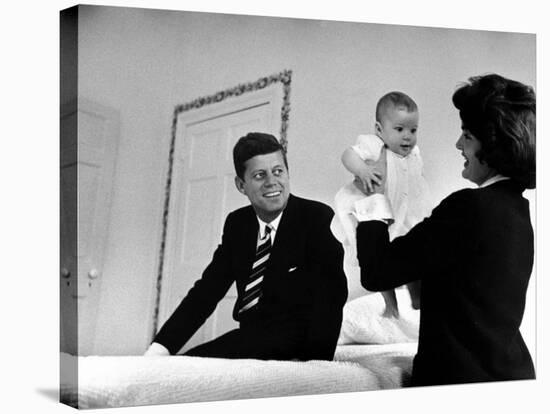 Senator Jack Kennedy Watching with Delight as His Wife Jackie Holds Up their Daughter Caroline-Ed Clark-Premier Image Canvas