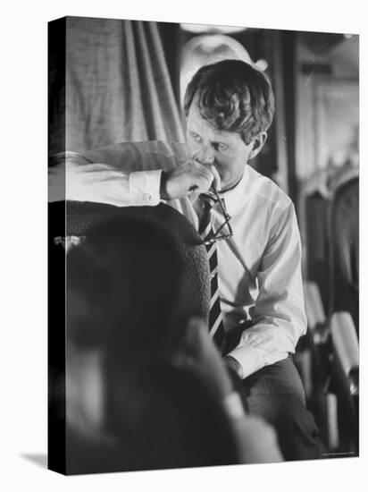 Senator Robert F. Kennedy Aboard Plane During Trip to Help Local Candidates-Bill Eppridge-Premier Image Canvas