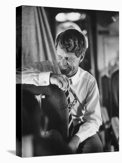 Senator Robert F. Kennedy Aboard Plane Traveling to Campaign For Local Democrats-Bill Eppridge-Premier Image Canvas