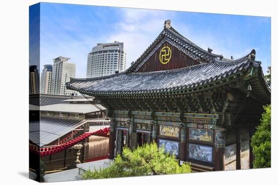 Seoul, South Korea, Gangnam, exterior of the Bongeunsa Buddhist temple with modern buildings in the-Miva Stock-Premier Image Canvas