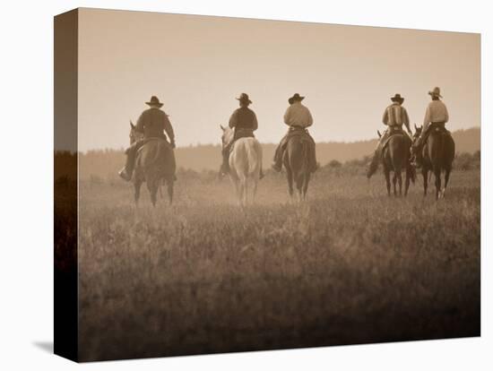 Sepia Effect of Cowboys Riding, Seneca, Oregon, USA-Nancy & Steve Ross-Premier Image Canvas