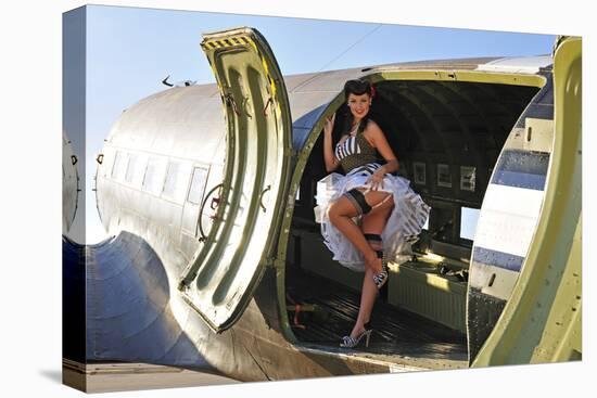 Sexy 1940's Style Pin-Up Girl Standing Inside of a C-47 Skytrain Aircraft-null-Premier Image Canvas