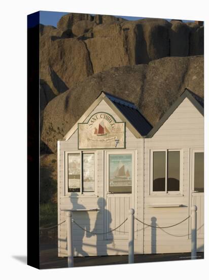 Shadow of Couple Walking Past Beach Huts, Granite Boulders, Cote De Granit Rose, Brittany-David Hughes-Premier Image Canvas