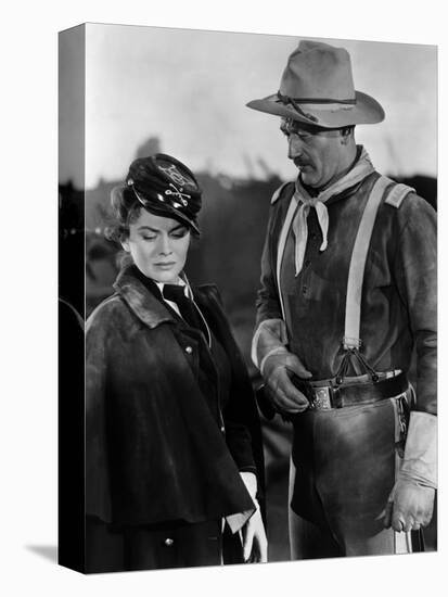 SHE WORE A YELLOW RIBBON, 1949 directed by JOHN FORD Joanne Dru and John Wayne (b/w photo)-null-Stretched Canvas
