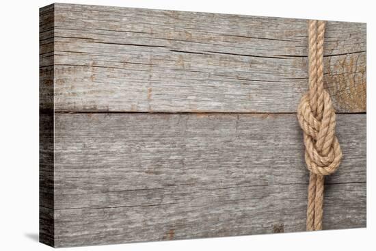 Ship Rope Knot on Old Wooden Texture Background-karandaev-Premier Image Canvas