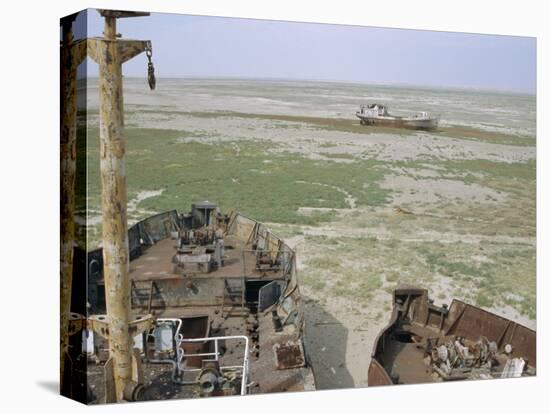 Ship's Graveyard Near Aralsk, on Seabed Due to Water Losses, Aral Sea, Kazakhstan, Central Asia-Anthony Waltham-Premier Image Canvas