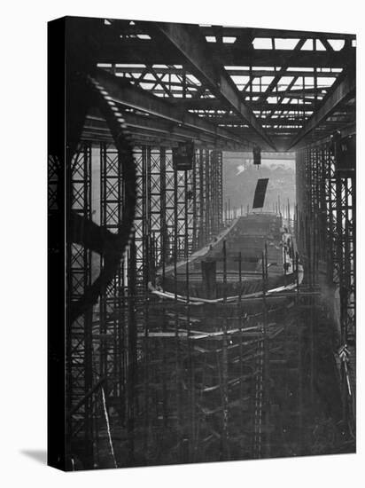 Shipbuilding, 10,000 Ton Merchantman Frames on Overhead Trolley Crane Dropping Plate into Position-William Vandivert-Premier Image Canvas