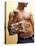 Shirtless Man Carrying an Animal Print Purse-Steve Cicero-Premier Image Canvas