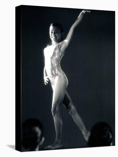 Side Profile of a Female Gymnast Posing-null-Premier Image Canvas