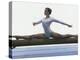 Side Profile of a Female Gymnast Stretching on a Balance Beam-null-Premier Image Canvas