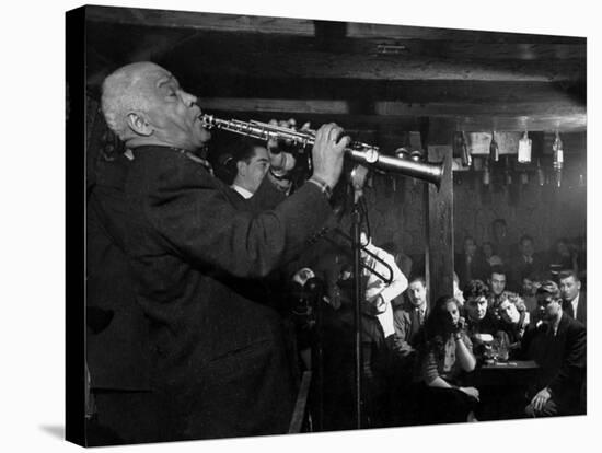 Sidney Bechet Performing in Small Basement Club "Vieux Colombier"-Nat Farbman-Premier Image Canvas