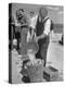 Sights of a Typical Summer at Cape Cod: Watering Clams to Aid the Steaming for Clambake-null-Premier Image Canvas