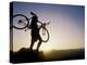 Silhouette of Mountain Biker at the Summit During Sunrise-null-Premier Image Canvas