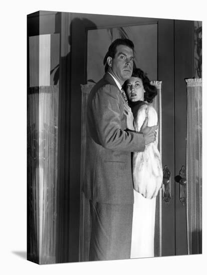 SINGAPORE, 1947 directed by JOHN BRAHM Fred MacMurray and Ava Gardner (b/w photo)-null-Stretched Canvas