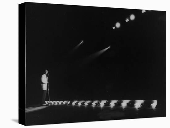 Singer Pat Boone Singing into Mike in Front of the Footlights on Stage in Auditorium-null-Premier Image Canvas