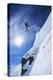 Skier Jumping from Mountain Ledge-null-Stretched Canvas