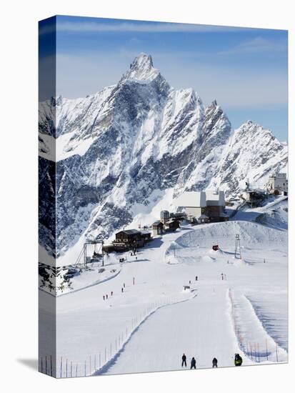 Skiers, Mountain Scenery in Cervinia Ski Resort, Cervinia, Valle D'Aosta, Italian Alps, Italy-Christian Kober-Premier Image Canvas