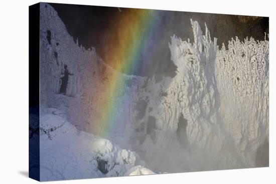 Skogafoss in Winter with Rainbow in Skoga, Iceland-Chuck Haney-Premier Image Canvas