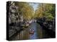 Small Boat on Tree-Lined Oudezijds Achtenburg Wal Canal in the Autumn, Amsterdam, the Netherlands-Richard Nebesky-Premier Image Canvas